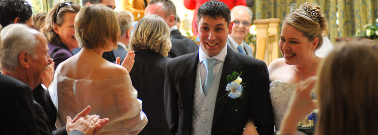 Newlyweds walking back down the aisle